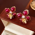 Elegant gold bee and red floral earrings with pearl details on a brown leather case - Floral Bee Earrings (7#)