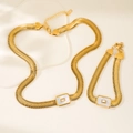 Flat lay of 18k gold plated snake chain jewelry set with square shell and zircon inlays - 41+5cm / White Necklace