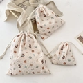 Set of three pink bear drawstring storage bags in small, medium, and large sizes - Goodnight Bear