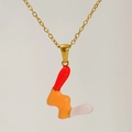 Artistic gold necklace featuring a letter L pendant in red orange and pink enamel - Red Orange Pink Enamel Letter W