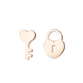 Detail shot of asymmetric heart lock and key earrings in polished rose gold finish - 428 Lock Key / Rose Gold