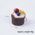 Realistic artificial chocolate mousse cupcake keychain with cherry and berry toppings - Black