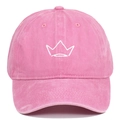 Close-up of pink washed cotton baseball cap with white embroidered crown and retro finish - Adjustable / Pink