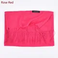 Soft rose red cashmere scarf with fringe details and woven label on white background - Rose Red
