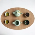 Celadon ceramic tea set with oval bamboo mat featuring teapot and cups for Kung Fu tea - Carbonized Oval 30x45cm