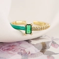 Macro shot of gold-plated ring with green rectangle zircon and enamel detail on silk - Adjustable Open / Green