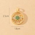 Detailed size view of evil eye pendant in gold with green crystals 2.5cm by 1.8cm - Gold Eye Shape Inlaid Green and Red Gems Pendant (D)