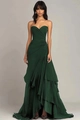 Detailed view of the dark green evening dress with pleated bodice and tiered ruffle skirt - S / Green