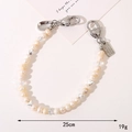 Edle Perlen-Schlüsselanhänger mit silbernem Herzanhänger und Kristallperlen, 25 cm lang - Beiges Naturmuschel Perlenarmband