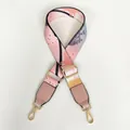 Detail view of ethnic graffiti print wide bag strap with pink leather and gold hardware - Graffiti Pink Leather Gold Hook