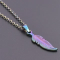 Minimalist feather pendant necklace in colorful stainless steel finish on matte background - Multicolor Necklace