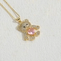 Gold bear pendant necklace with white zircons and a pink heart gem on stone base - Pink Heart (XL2572-3)