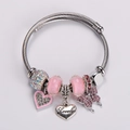 Detail showing pink butterfly charm and engraved Lovely heart on silver twisted wire bracelet - Pink Series (Style 1)