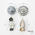 Set of 4 space astronaut and UFO resin ornaments with gold hangers for Christmas decor - Space Set (4 Pieces)