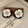 2502159 Black And White Camellia Earrings (s925 Silver Needle)