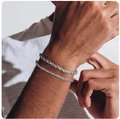 Set of two unisex silver stainless steel rope chain bracelets shown on wrist - Style 8