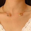 Detailed close-up of a golden textured shell charm on a choker with sea-inspired design - Textured Shell Open Gold Style (G-320)