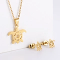 Detailed view of hollow turtle jewelry set with gold necklace and matching earrings - Turtle