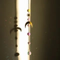 Golden moon and sun suncatcher with pink crystal beads casting rainbow light reflections - Design No.18