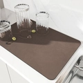 Absorbent brown kitchen drying mat with non-slip texture on marble countertop - Minimalist Coffee