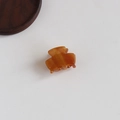 Mini amber marble pattern cellulose acetate hair claw clip for bangs and styling - Caramel color