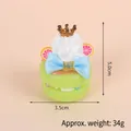 Pink macaron cake keychain with a crown, blue bow, and faux fruit decor, 5cm height - Gold Bead Chain / 037 Green Cake Blue Bow