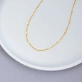 Minimalistische vergulde koperen ketting met gepolijste kleine vierkante cilinders - Gouden Eenvoudige Kettingarmband