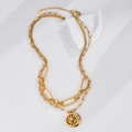Collana a doppio strato in acciaio inossidabile placcato oro 18K con sole e luna - Stile Ciondolo Sbalzato Sole e Luna a Doppio Strato (N2150)