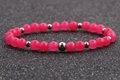 Elastic beaded bracelet featuring 6mm translucent rose pink stones and silver metal spacers - 6MM Rose Red