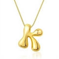 Polished 18k gold plated bubble letter K pendant necklace with a glossy metallic finish - Letter K