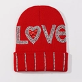 Winter red knitted beanie with LOVE rhinestone embellishment and sparkling accents - One Size / Red