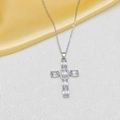 Detailed view of silver cross necklace with lavender oval gemstones and diamond accents - Silver White Necklace