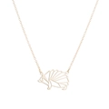 Detail of a minimalist gold cutout origami hedgehog pendant on a delicate chain necklace - Hedgehog / Gold