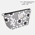White hexagonal makeup organizer bag with floral pattern and secure zipper, 23x8x12cm size - Hexagonal Bag / White