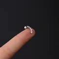 Curved 16G silver stainless steel ear stud featuring five graduated clear zircons - Graduated Zircon Curve Style (333-5#S)