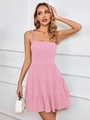 Detail of pink tiered sundress with adjustable shoulder ties and layered ruffle hem - Pink