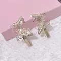 Silver butterfly hair clips in hollow metal style, sold as a pair for women - Butterfly Pair (2 Pcs/Set) / KC Gold