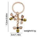 Detailed view of rose gold bee keychain with size dimensions 7.2cm and 9.1g weight - Three Bees Rhinestone