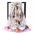 Detailed pattern of silk scarf featuring gold chains, belts and pink floral accents - Pink White Chain Shield (019)