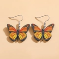 Vibrant orange monarch butterfly acrylic drop earrings with silver hooks for women - Orange Monarch Butterfly (4026)