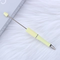 DIY beadable ballpoint pen featuring a light yellow matte grip and silver metal rod - Milky Yellow