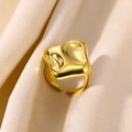 Detailed view of wide gold liquid metal ring with lava texture on cream silk fabric - Gold Irregular Lava Ring (JZ6693G) / Adjustable Open