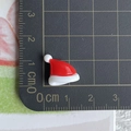 Mini resin Christmas hat accessory shown on a measuring mat for accurate size reference - 05-Triangular Christmas Hat