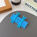 Pair of matte Klein blue X-shaped hair clips on card for women dopamine style styling - Blue Cross (Pair)
