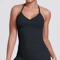 Detail of black halter neck sports bra with ruched V-neckline for fitness and yoga - Black
