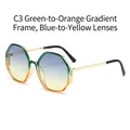 Occhiali da sole poligonali con montatura sfumata verde-arancio e lenti blu-gialle - Montatura Verde Arancio Lenti Blu Gialle