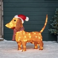 Light up Dachshund Christmas dog figure with red hat and warm LED lights for outdoor decor - Dachshund