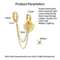 Orecchini a catena in oro 18K con ciondolo a sole e cristalli scintillanti - Oro