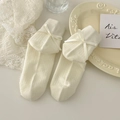 Sweet cream ribbed socks with delicate ribbon bow accent for a vintage look - One Size / Cream