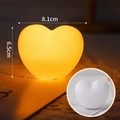 Heart-shaped cake topper light with warm orange glow for romantic event decoration - White Plastic Heart Lamp / White